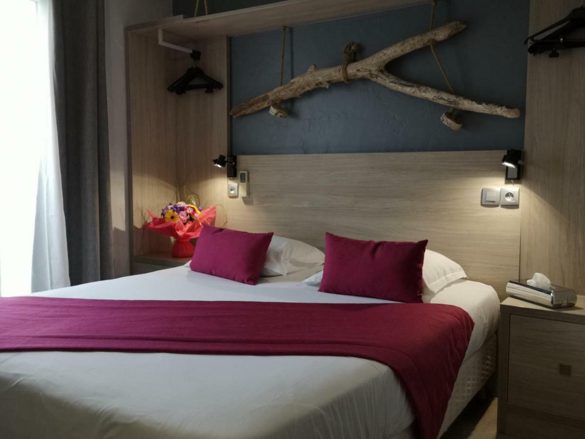 Atoll Hotel Restaurant Frejus Bagian luar foto