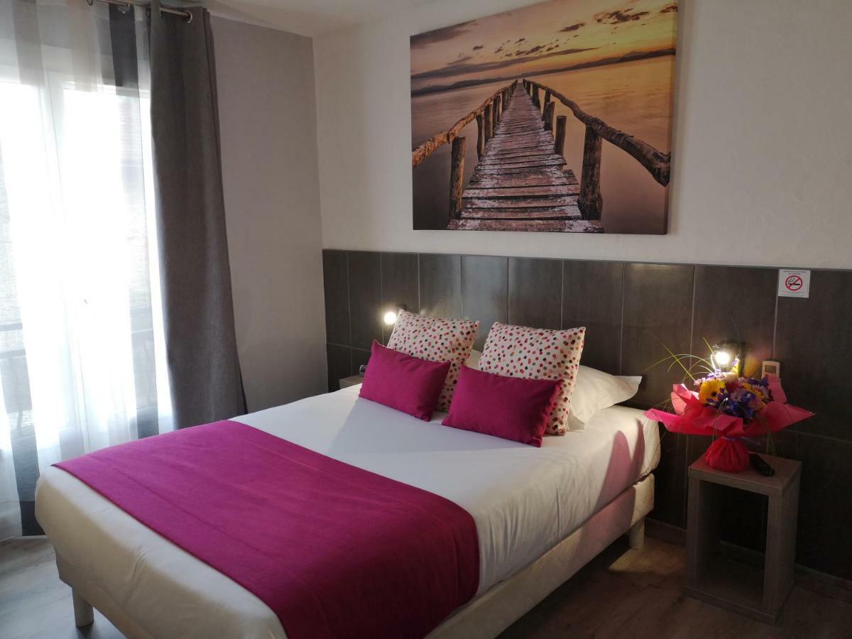 Atoll Hotel Restaurant Frejus Bagian luar foto