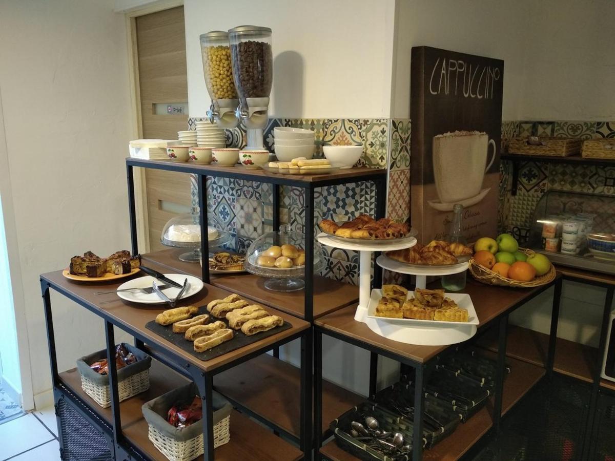Atoll Hotel Restaurant Frejus Bagian luar foto